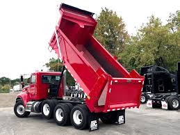 Tri-Axle Dump Truck with an Indiana IRP plate, Indiana IRP license plate, Indiana Apportioned IRP license plate, Indiana IRP Apportioned license plate